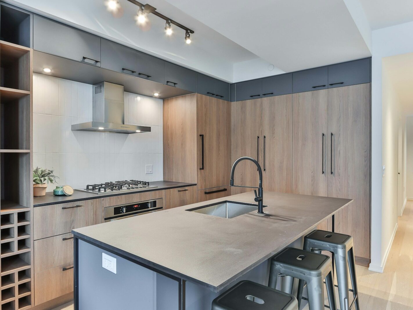 white wooden kitchen cabinet with stainless steel faucet